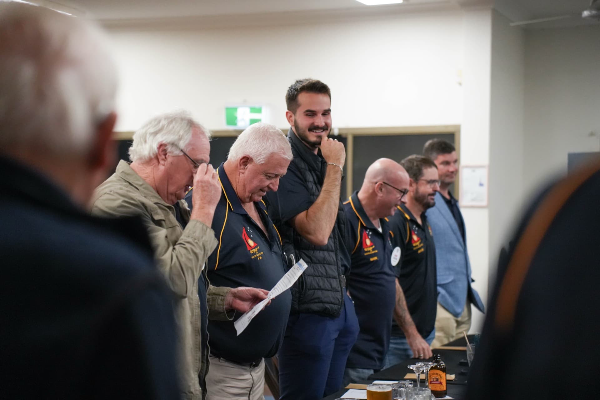 Members standing for the Loyal Toast
